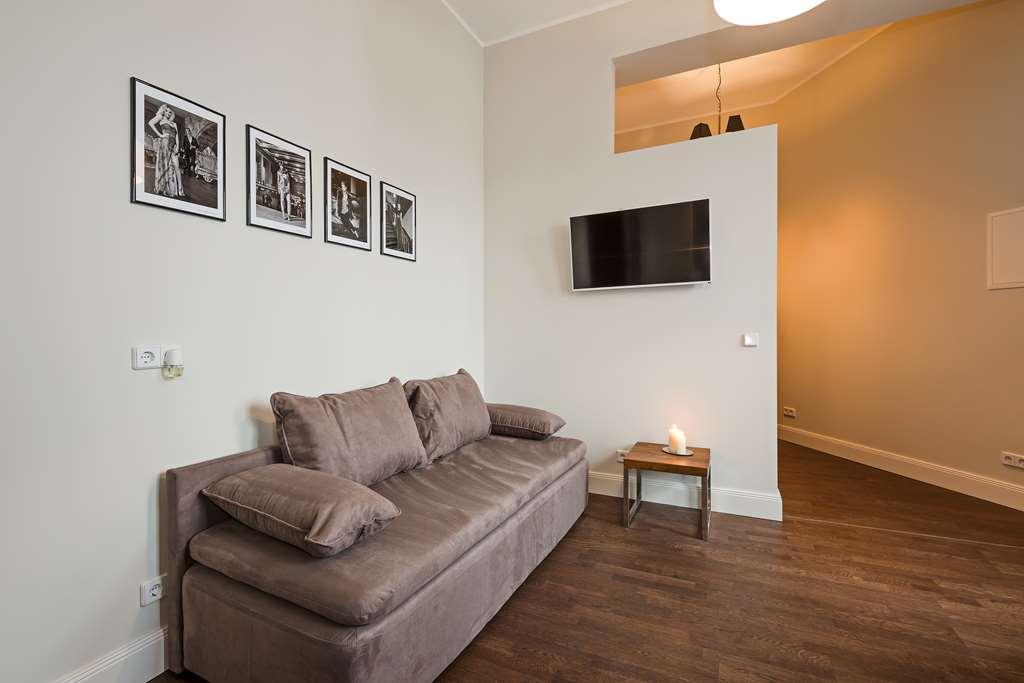 Arabel Design Apartments Berlin Rum bild A living room in a typical apartment